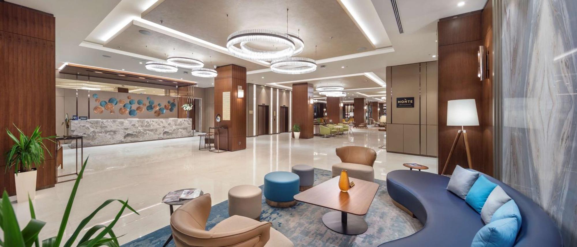 Doubletree By Hilton Skopje Hotel Bagian luar foto Lobby